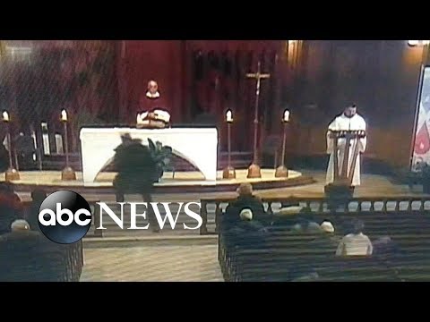 Livestreamed video shows man allegedly stabbing priest during mass episode artwork