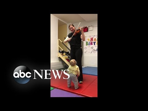 Mother captures moment toddler hears violinist for the first time episode artwork