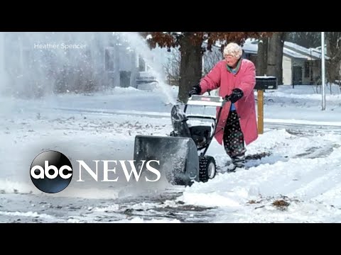 Photo of an 82-year-old woman using her snow blower in the freezing cold goes viral episode artwork