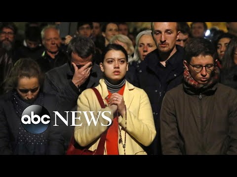 Parisians find comfort in song as they pray for beloved Notre Dame Cathedral episode artwork