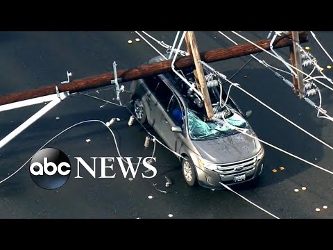 Downed power lines leave 2 people trapped in car episode artwork