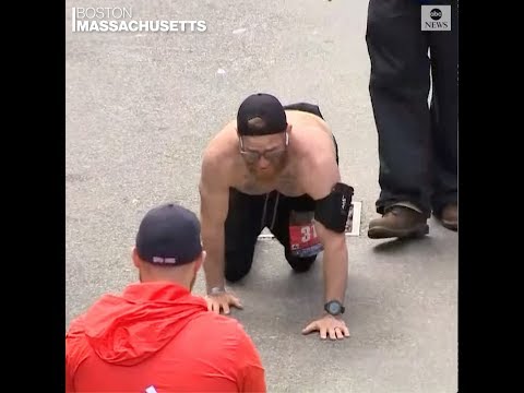 Marine veteran crawls across Boston Marathon finish line | ABC News episode artwork