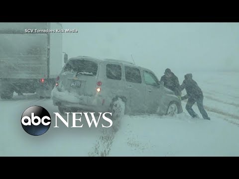 Travel warnings as snowstorm hits East Coast episode artwork