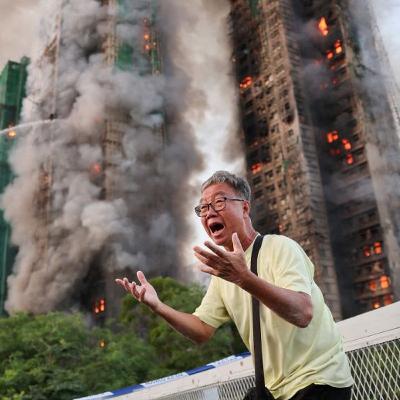 Hong Kong high-rise fire kills at least four as emergency crews battle flames