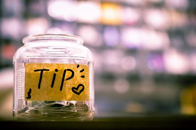 Tipping has gotten out of hand. A University of Kansas professor suggests how to fix it