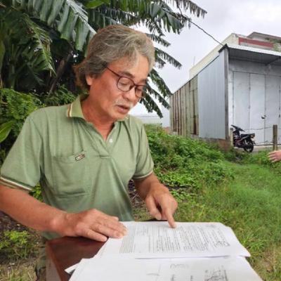 Lô đất được cấp sổ đỏ nhưng không có trên thực địa: 'Khổ chủ' và địa phương nói gì? Lô đất được cấp sổ đỏ nhưng không có trên thực địa: 'Khổ chủ' và địa phương nói gì?