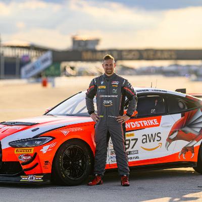 Otto talks with GT4 driver Kevin Boehm
