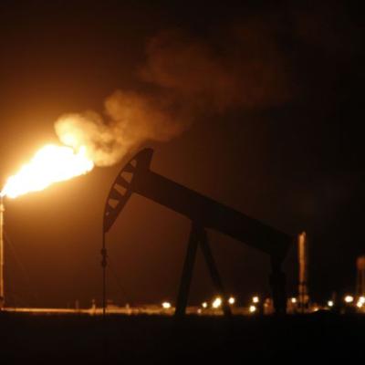 Oil slipped towards $84 a barrel, the first weekly loss in about two months