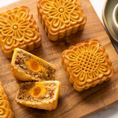 Vietnamese baked Moon cake with mixed nuts filling