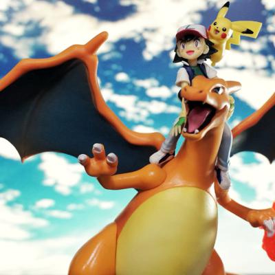 Leco e seu novo amigo Charizard