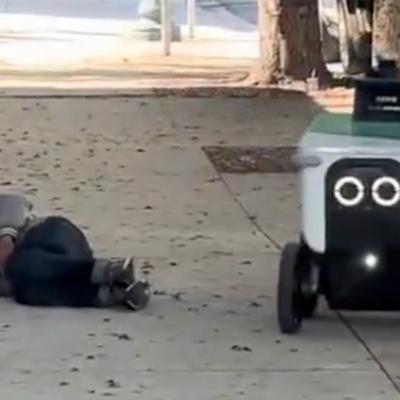Meditations On A Delivery Robot Steering To Avoid A Homeless Man On The Sidewalk Meditations On A Delivery Robot Steering To Avoid A Homeless Man On The Sidewalk