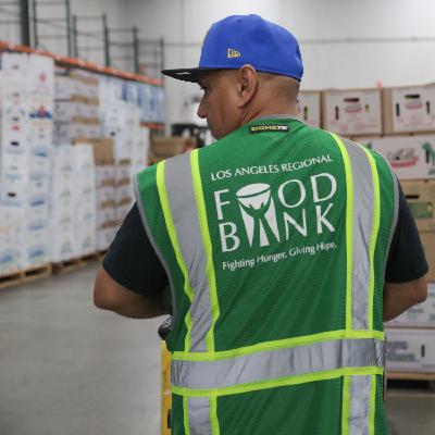 Food aid is cut in half for millions as the shutdown drags on