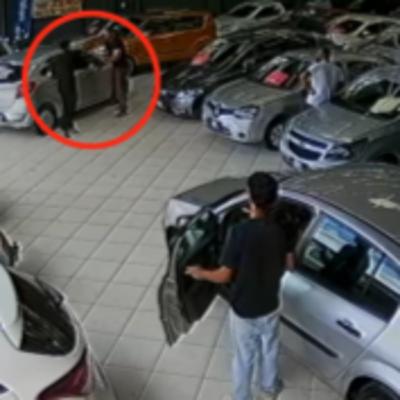 SUPOSTO TALARICO É EX3CUT4DO EM LOJA DE CARROS E EXECUT0R DEIXA RECADO