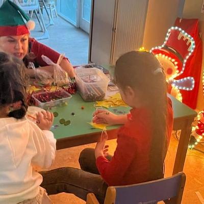 Santa makes an early stop to bring gifts to homeless children