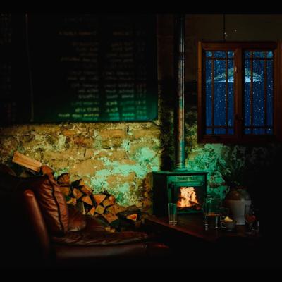 Dark Cafe Tavern W/Old Coffee Grinder & People Mumbling