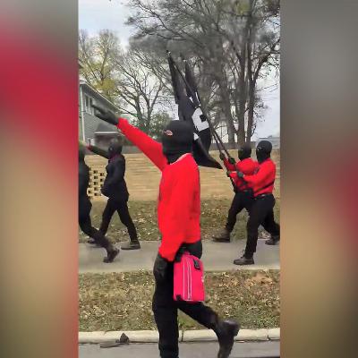 Masked neo-Nazis march through Arkansas community Masked neo-Nazis march through Arkansas community