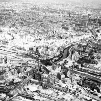 S8 Ep843: Ian Buruma discusses his book Stay Alive, focusing on his father Leo's 1943 decision to enter mandatory labor in a Berlin factory to protect his parents from Nazi retaliation. The narrative explores Berlin's transition from a striving capital into a city