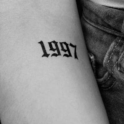 Descubra o mistério por trás da tatuagem 1997