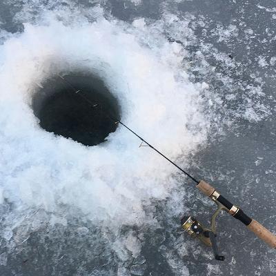 Ice fishing with Alex Welter of River Bent Outfitters