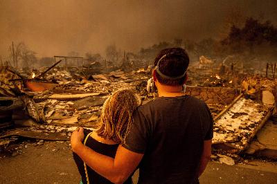 Why the road to rebuilding homes after fires is complicated