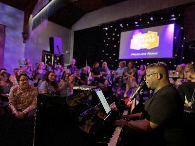 Inside a showtunes sing-along bar, and composer Fritz Hart's unsung career