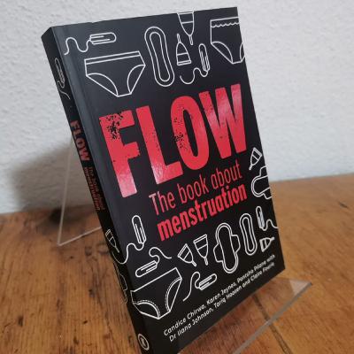 One of the authors Pontsho Pilane helps review their work-  Flow: The Book About Menstruation