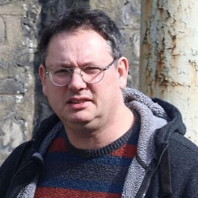 UCD professor charged with harassment and unlawfully accessing  students data