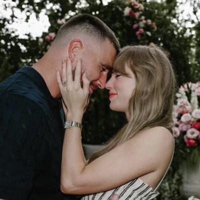 Travis Kelce's Dad Reveals The Truth Behind Engagement Pics