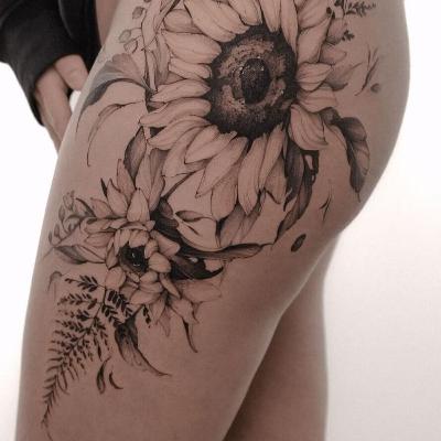 30 Ideias Incríveis de Tatuagens na Coxa para Inspirar Você