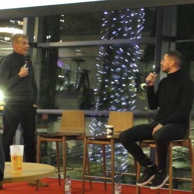 Tom Watt speaks to former Arsenal striker Jérémie Aliadière as part of the AST Christmas event.
