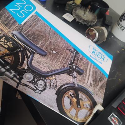 Lou with the 2025 moped calendar and more moped talk Lou with the 2025 moped calendar and more moped talk