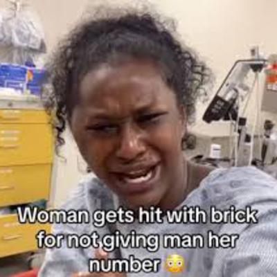 Woman got hit with a brick?