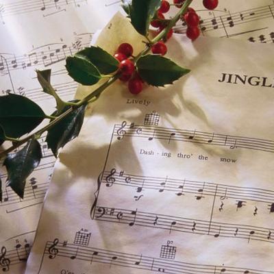 Love them or hate them tis’ the season for Christmas songs