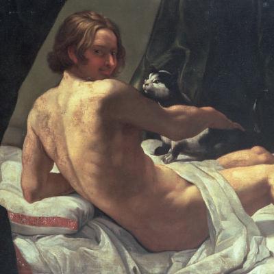 Jeune homme nu sur un lit avec un chat Jeune homme nu sur un lit avec un chat