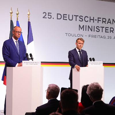 Macron, Merz vow to defend EU's legislation