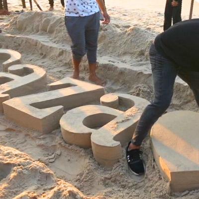 Palestinian sculptors create art on Gaza beach sand to escape Israel’s war