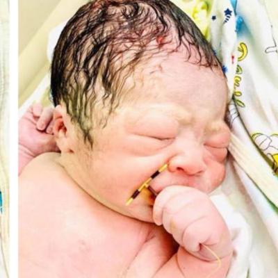 What's in that baby's hand?! What's in that baby's hand?!
