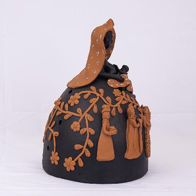 Arte que vem do barro e da madeira