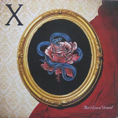X’s “Ain’t Love Grand” (with Jenny and Michael Seman)