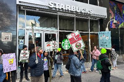 Starbucks baristas strike at nearly 100 locations